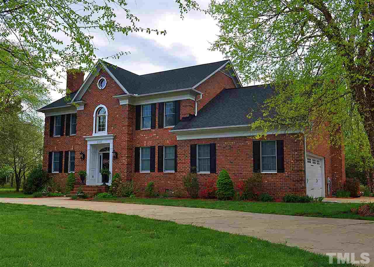 3161 Fieldstone Lane Mebane, NC 27302 - Photo 11 of 30 front view of a house with a yard