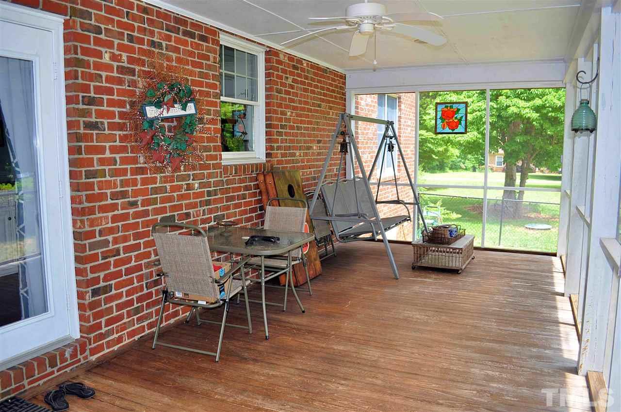 3161 Fieldstone Lane Mebane, NC 27302 - Photo 14 of 30 a backyard of a house with seating space