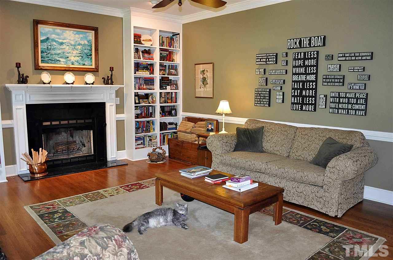 3161 Fieldstone Lane Mebane, NC 27302 - Photo 16 of 30 a living room with furniture and a fireplace