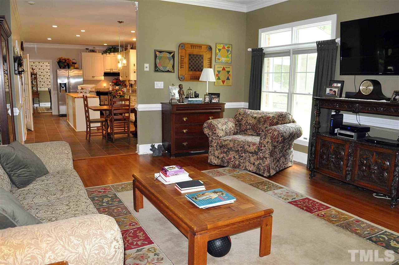 3161 Fieldstone Lane Mebane, NC 27302 - Photo 17 of 30 a living room with furniture and a flat screen tv