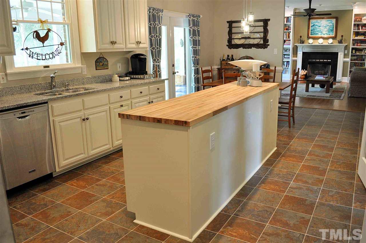 3161 Fieldstone Lane Mebane, NC 27302 - Photo 19 of 30 a kitchen with a sink cabinets and window