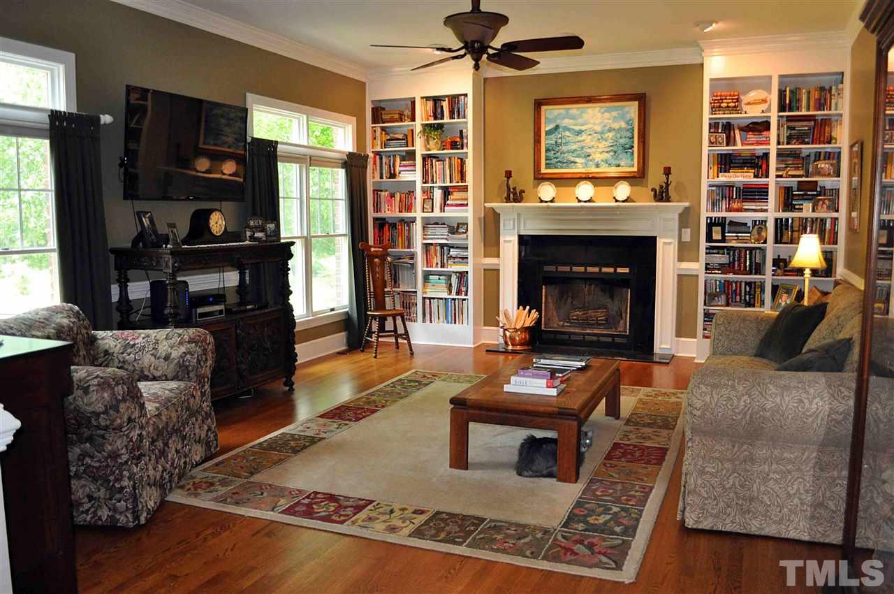 3161 Fieldstone Lane Mebane, NC 27302 - Photo 3 of 30 a living room with furniture and a fireplace