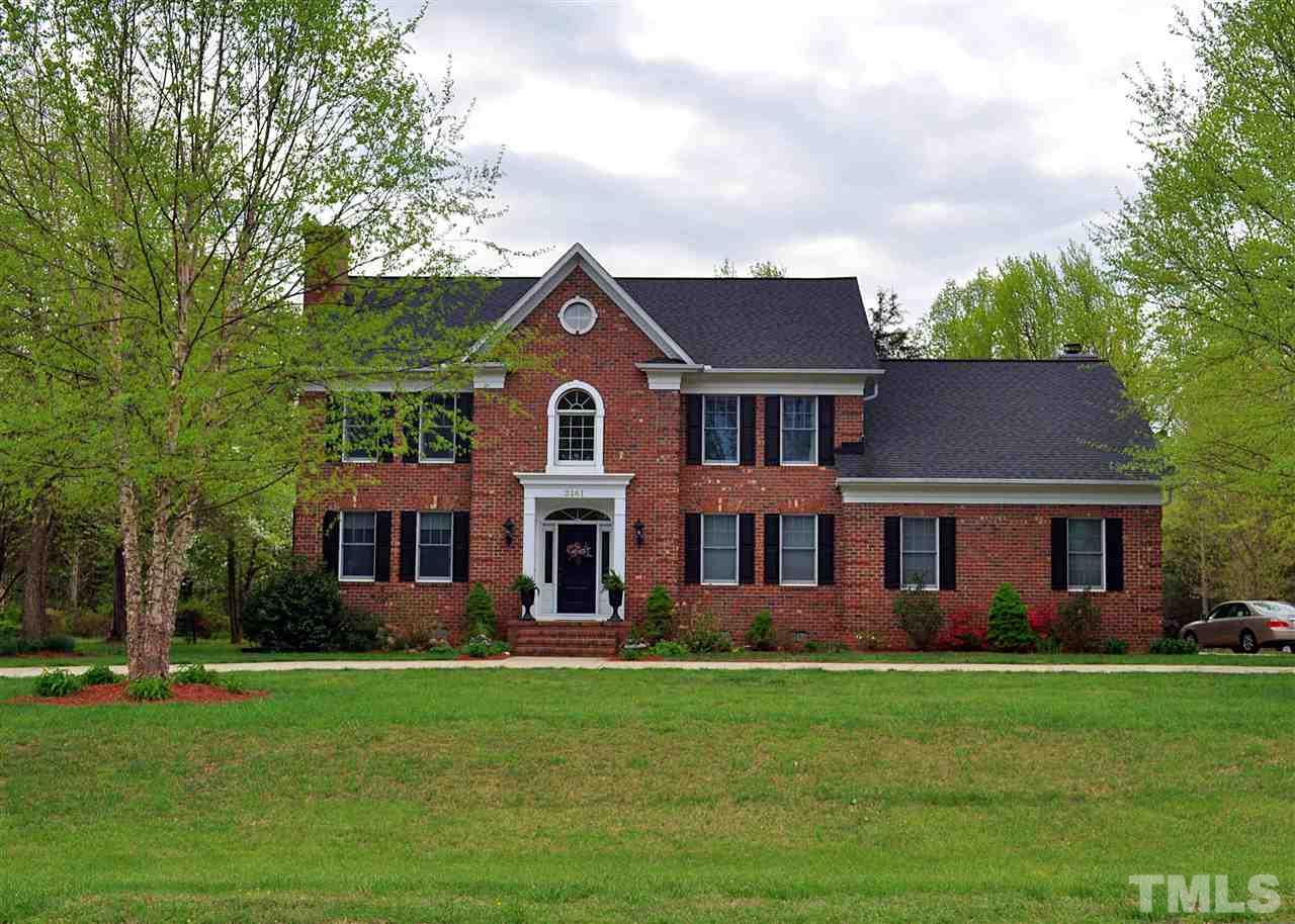 3161 Fieldstone Lane Mebane, NC 27302 - Photo 23 of 30 a front view of a house with a yard table and chairs