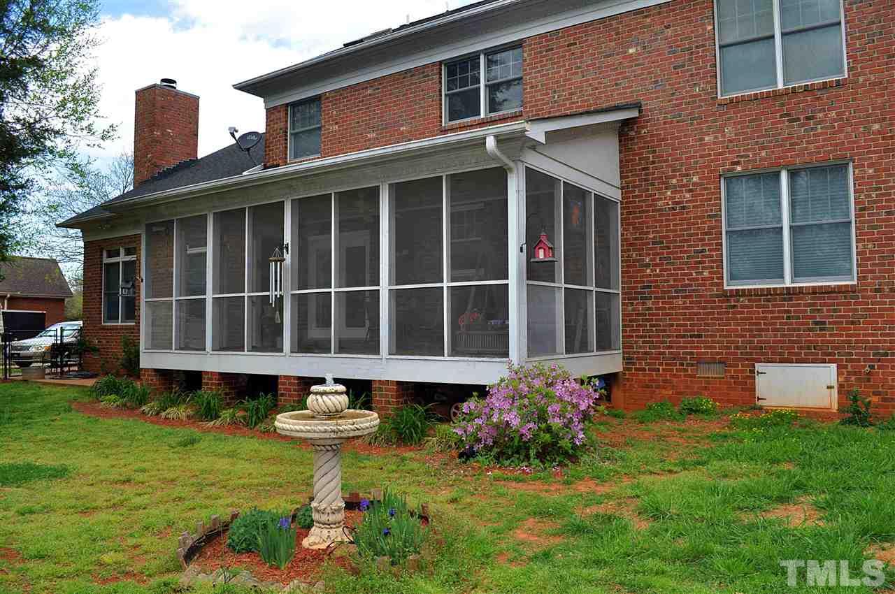 3161 Fieldstone Lane Mebane, NC 27302 - Photo 24 of 30 a front view of a house with a yard