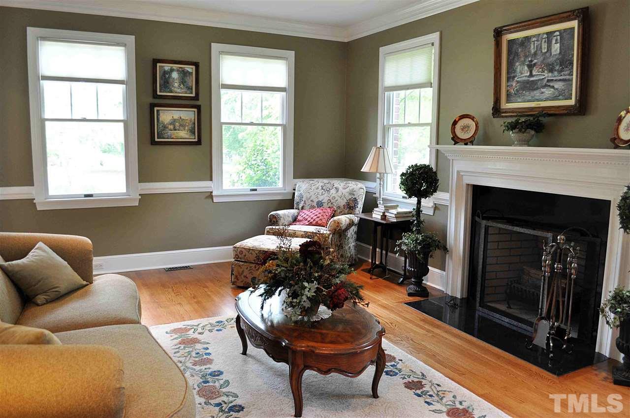 3161 Fieldstone Lane Mebane, NC 27302 - Photo 25 of 30 a living room with furniture a window and a fireplace
