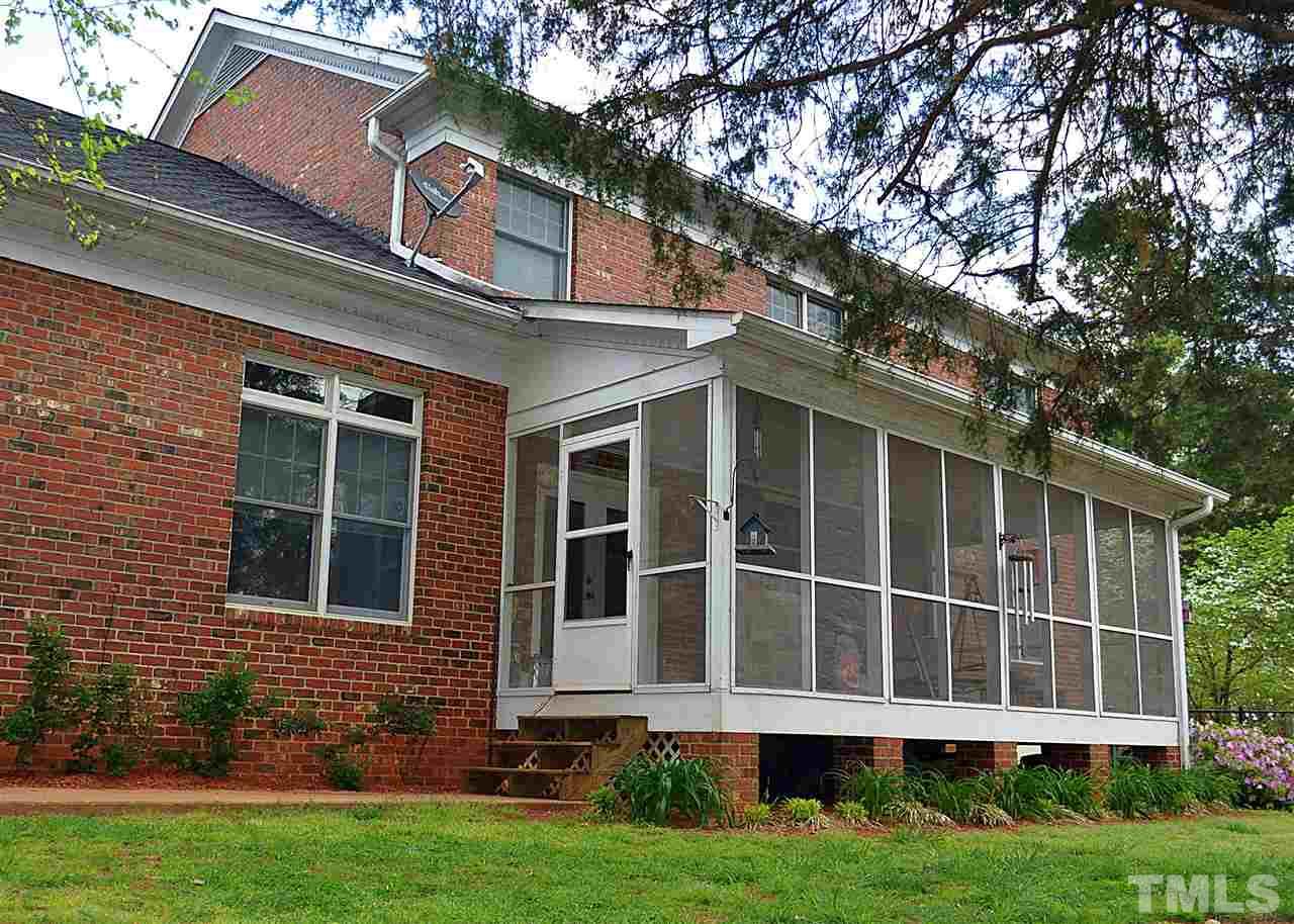 3161 Fieldstone Lane Mebane, NC 27302 - Photo 26 of 30 a large brick building with a large windows