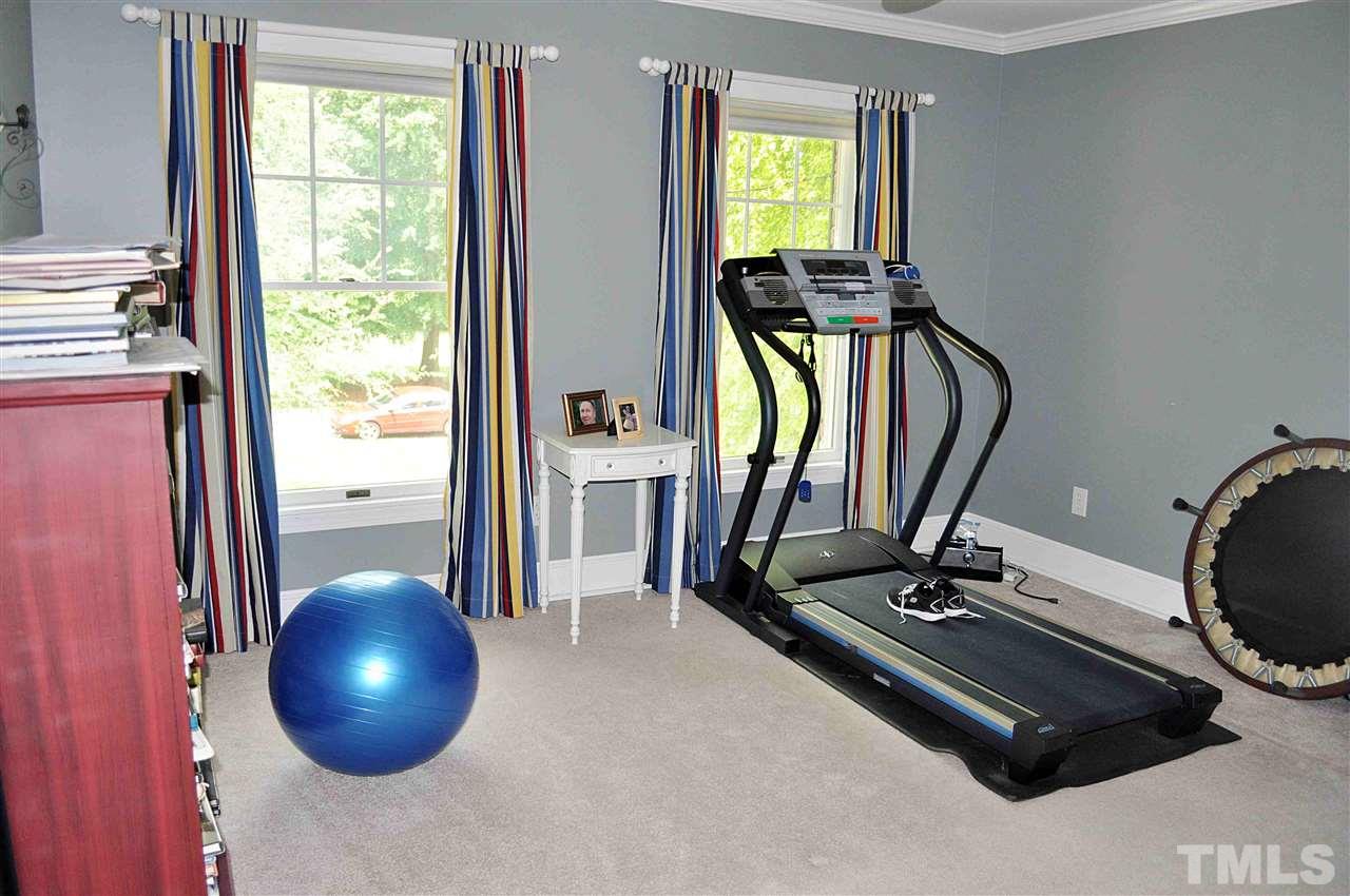 3161 Fieldstone Lane Mebane, NC 27302 - Photo 9 of 30 a view of a room with gym equipment