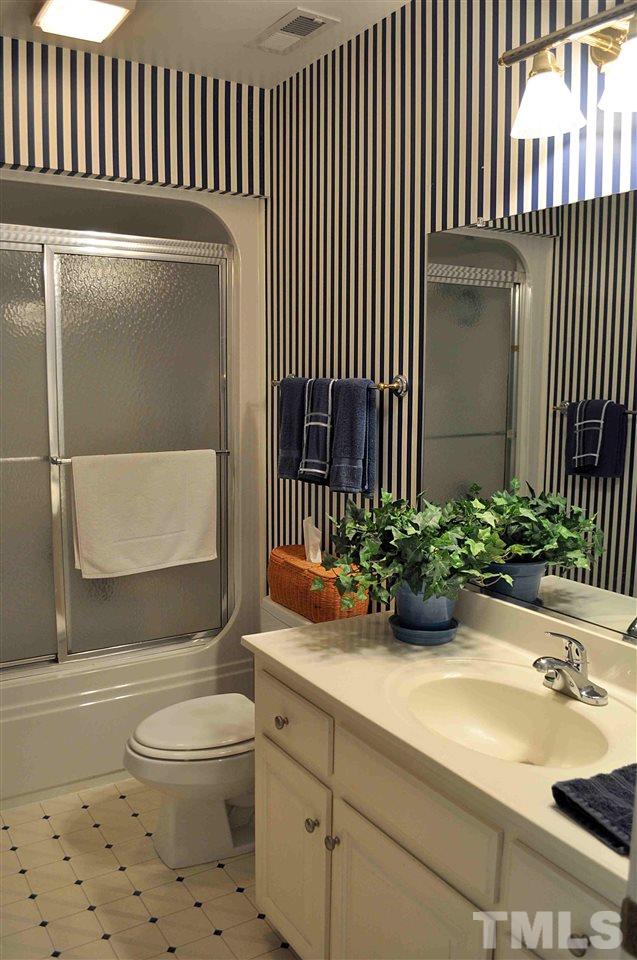 3161 Fieldstone Lane Mebane, NC 27302 - Photo 10 of 30 a bathroom with a sink toilet and shower