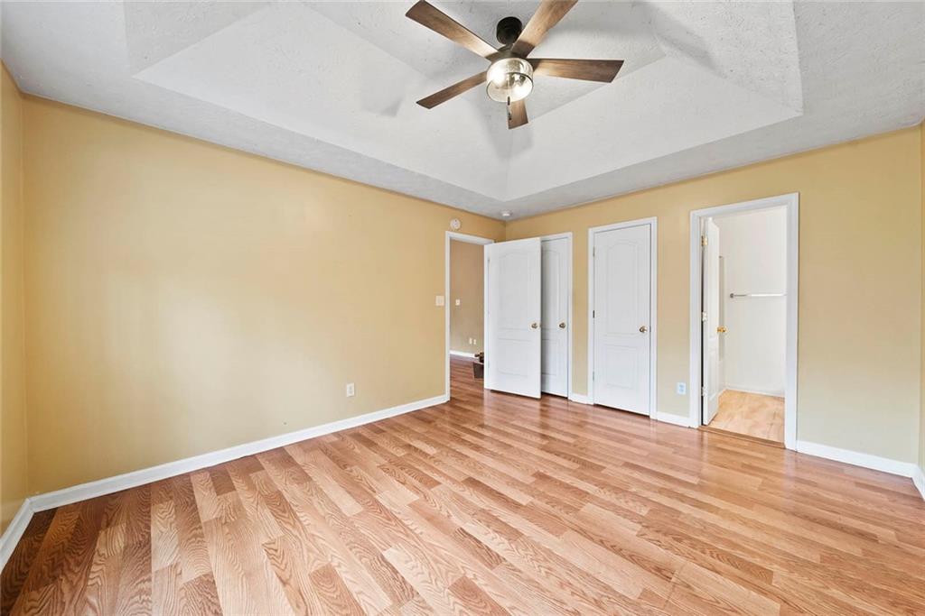 42 Crow Court Monticello, GA 31064 - Photo 14 of 33 a view of empty room with wooden floor