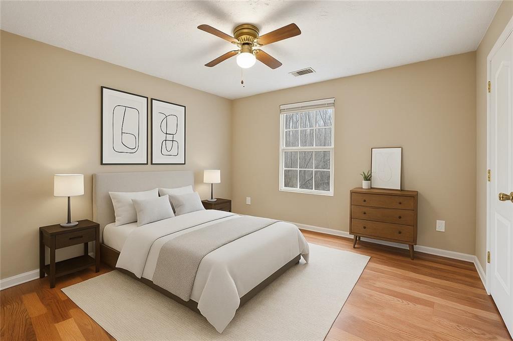 42 Crow Court Monticello, GA 31064 - Photo 17 of 33 a bedroom with a bed and a window