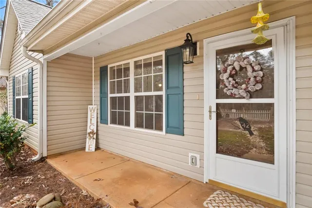 a view of a door and a window
