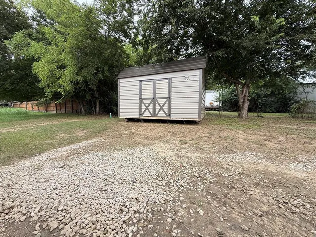a view of backyard with green space