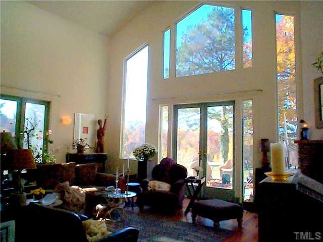 6097 Bob Daniel Road Oxford, NC 27565 - Photo 5 of 24 a living room with furniture and a large window