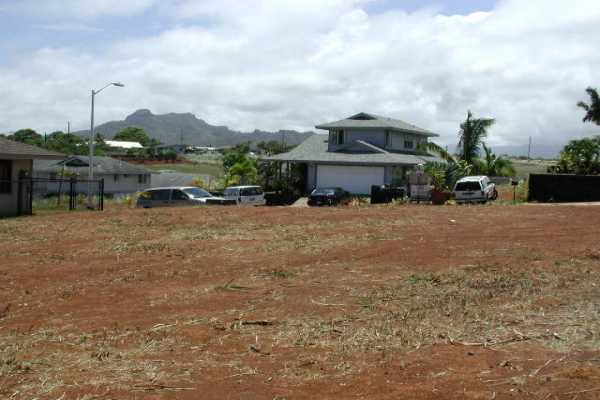 4817 Ohu Road Kapaa, HI 96746 - Photo 3 of 6 a view of a lake with houses in the back