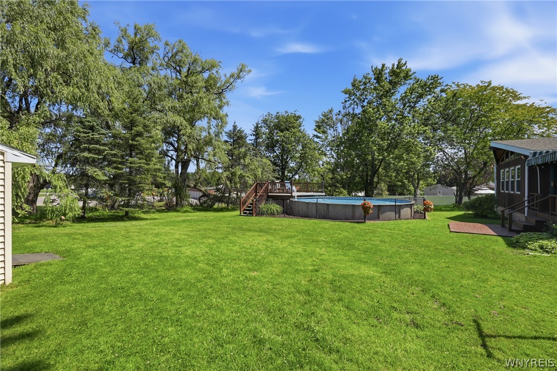 12 Beverly Drive Evans, NY 14006 - Photo 31 of 41 Tree-lined backyard