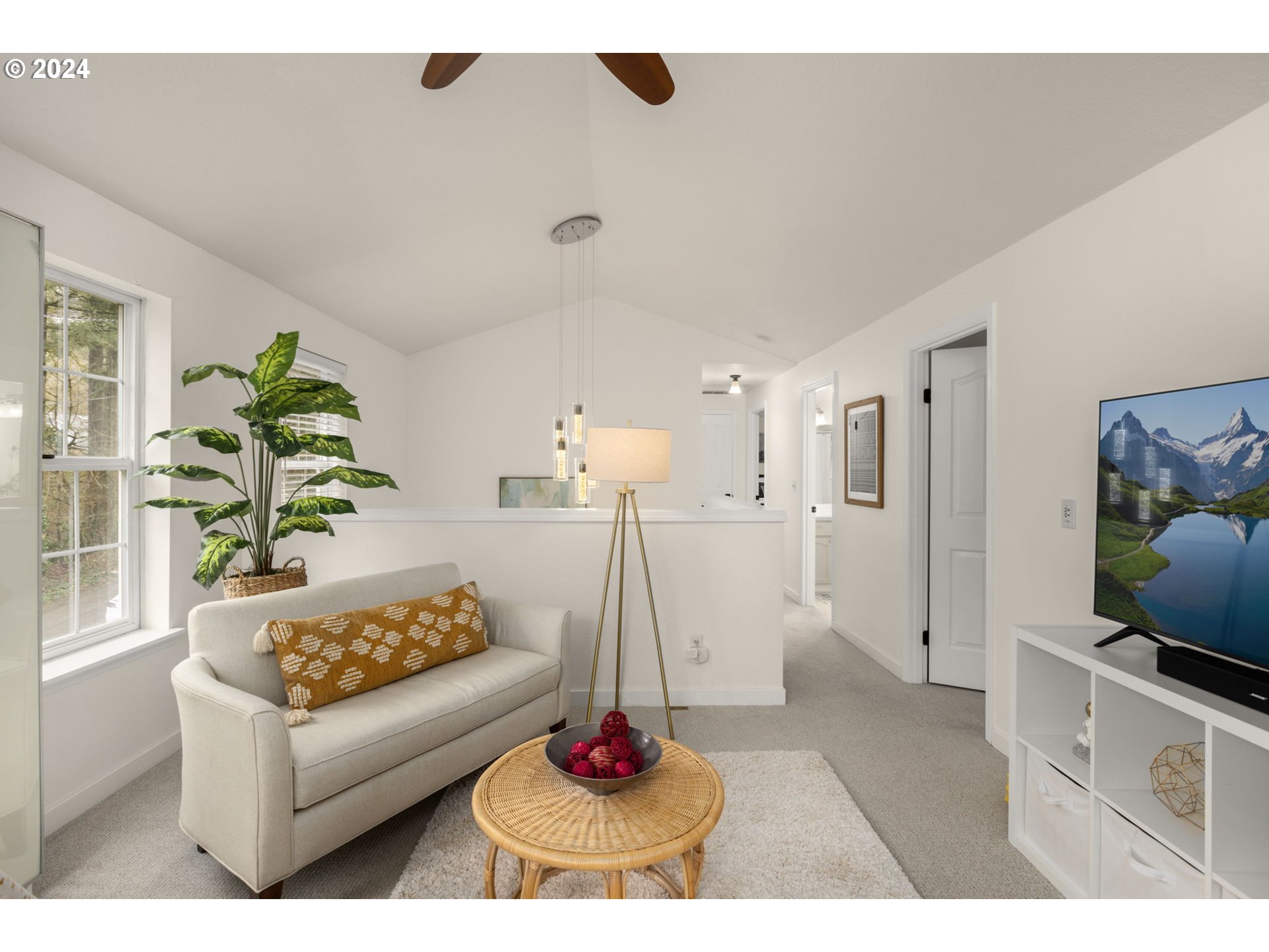 3625 Southwest Vacuna Street Portland, OR 97219 - Photo 15 of 27 a living room with furniture and a flat screen tv