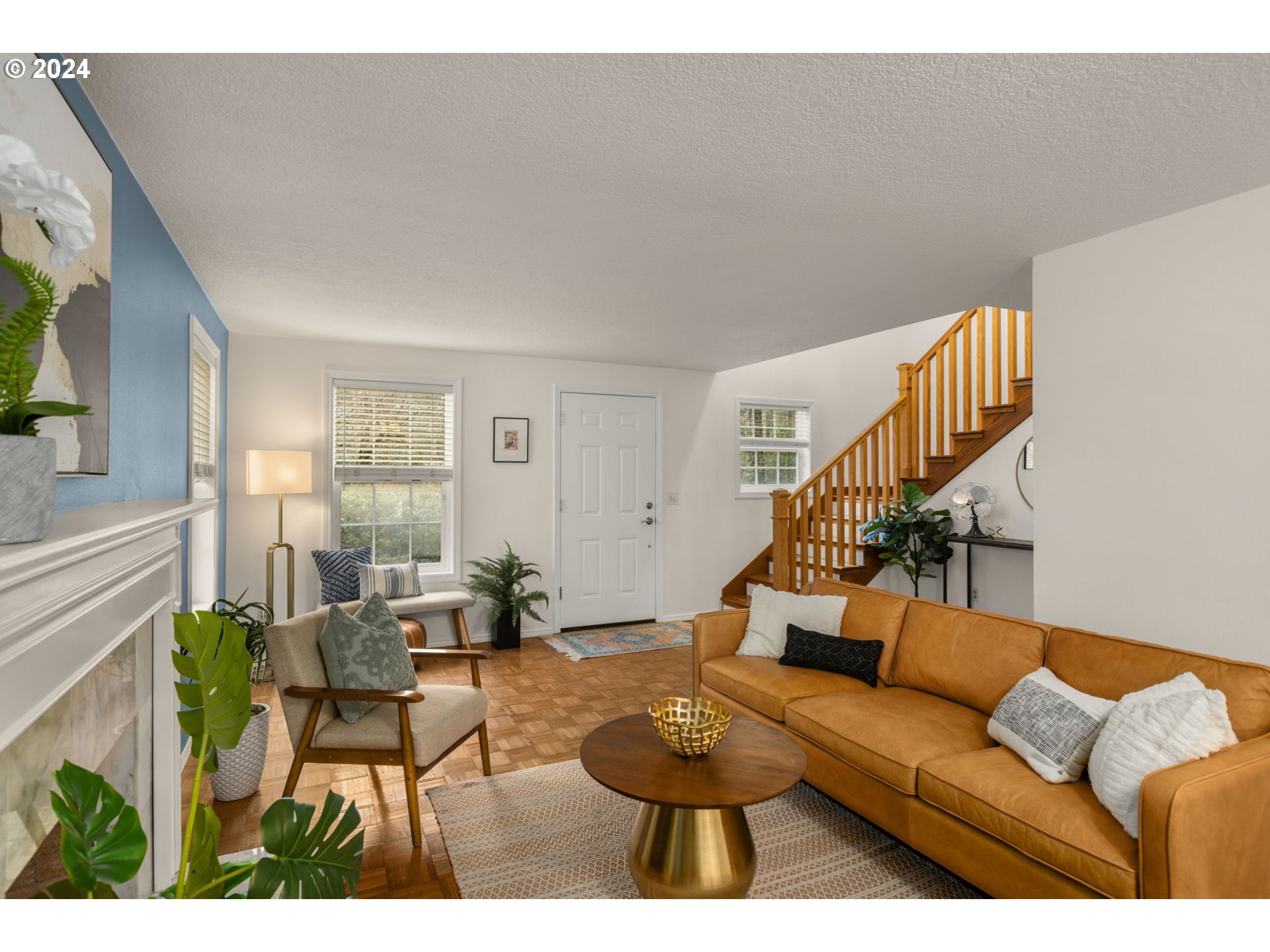 3625 Southwest Vacuna Street Portland, OR 97219 - Photo 4 of 27 a living room with furniture and a wooden floor