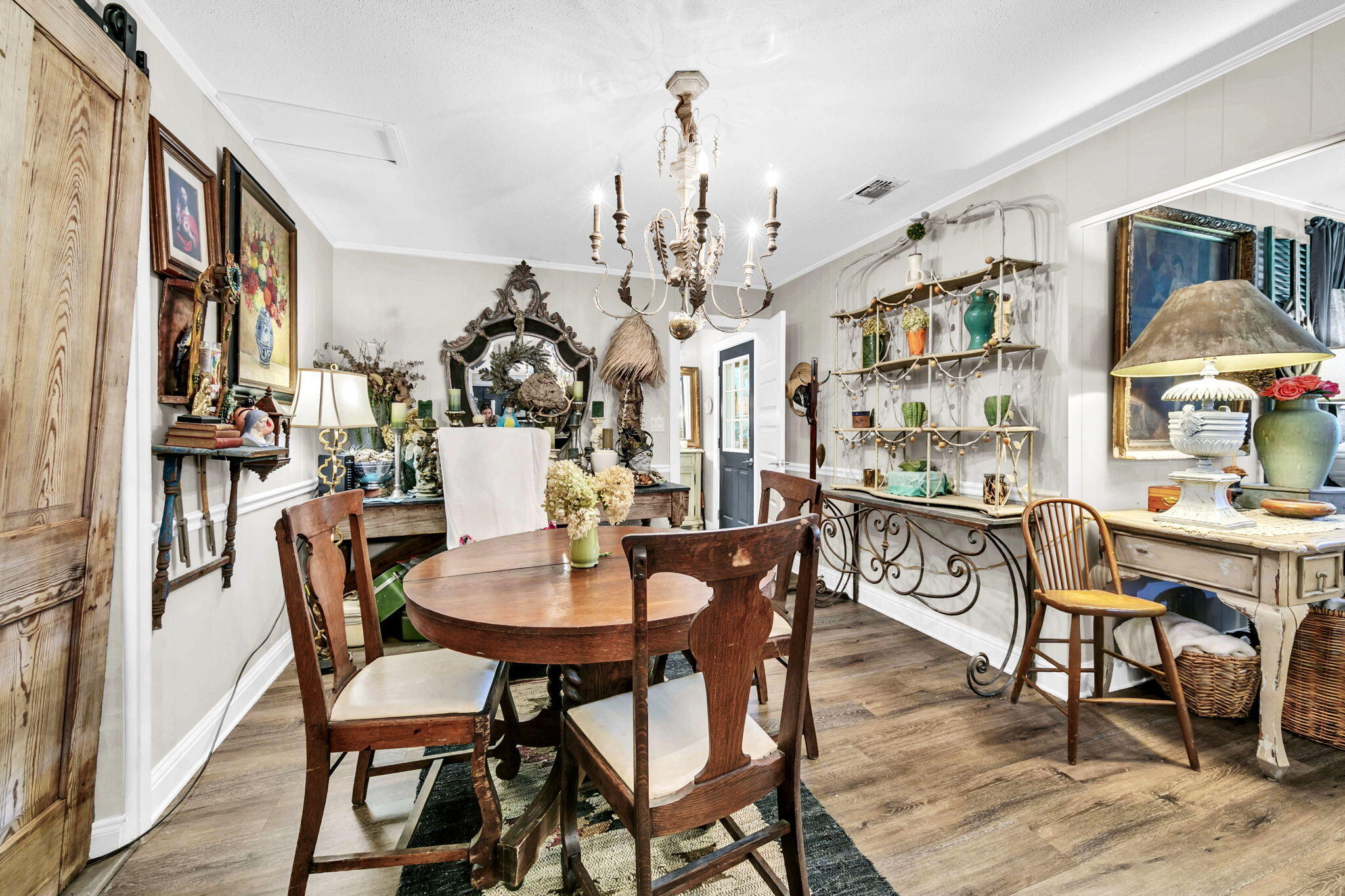 90 Jones Drive Freeport, FL 32439 - Photo 19 of 44 a view of a dining room with furniture and chandelier