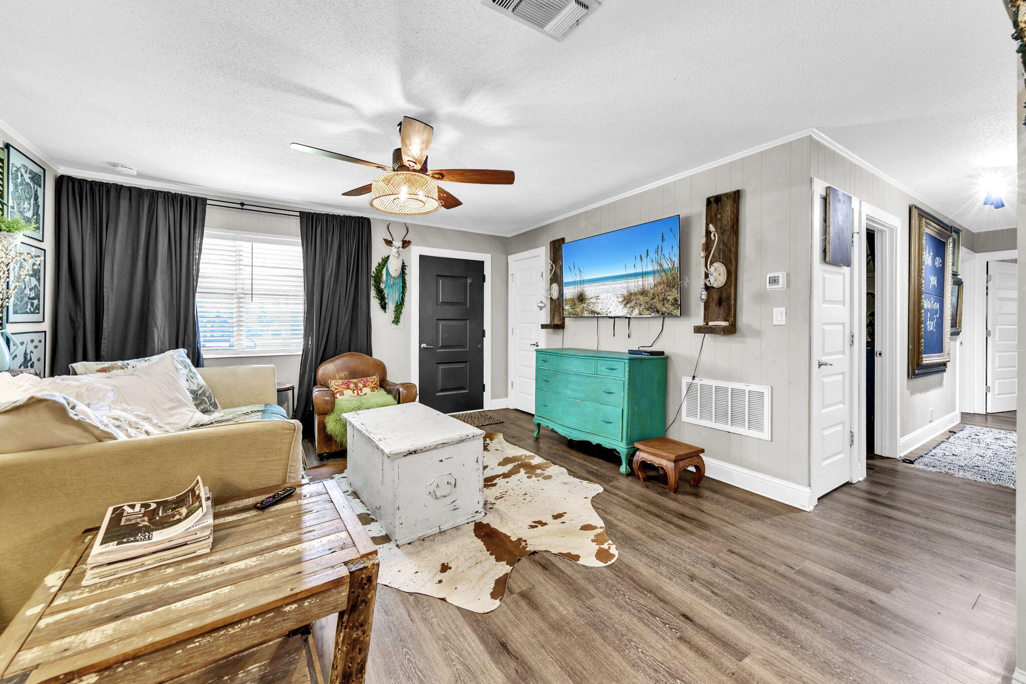 90 Jones Drive Freeport, FL 32439 - Photo 26 of 44 a living room with fireplace furniture and a wooden floor