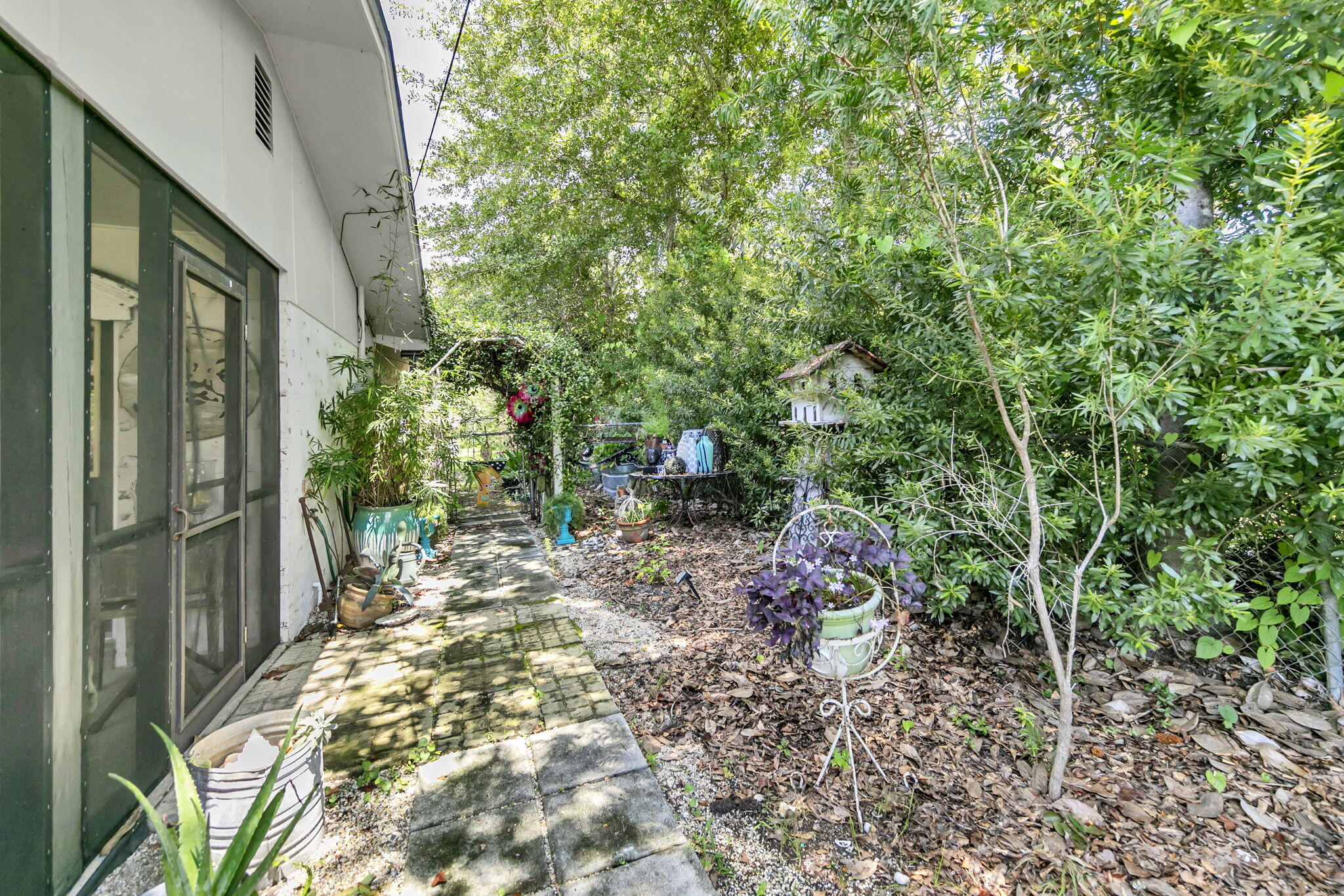 90 Jones Drive Freeport, FL 32439 - Photo 32 of 44 a backyard of a house with outdoor seating