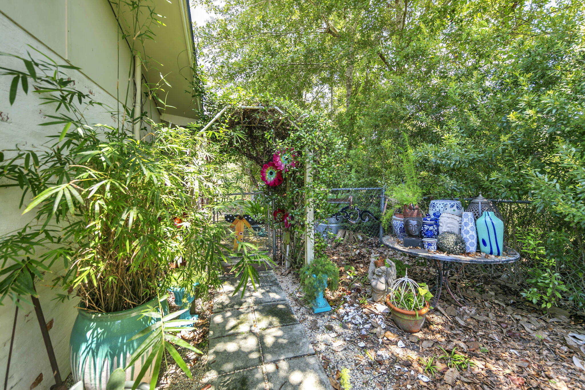 90 Jones Drive Freeport, FL 32439 - Photo 33 of 44 a backyard of a house with lots of green space