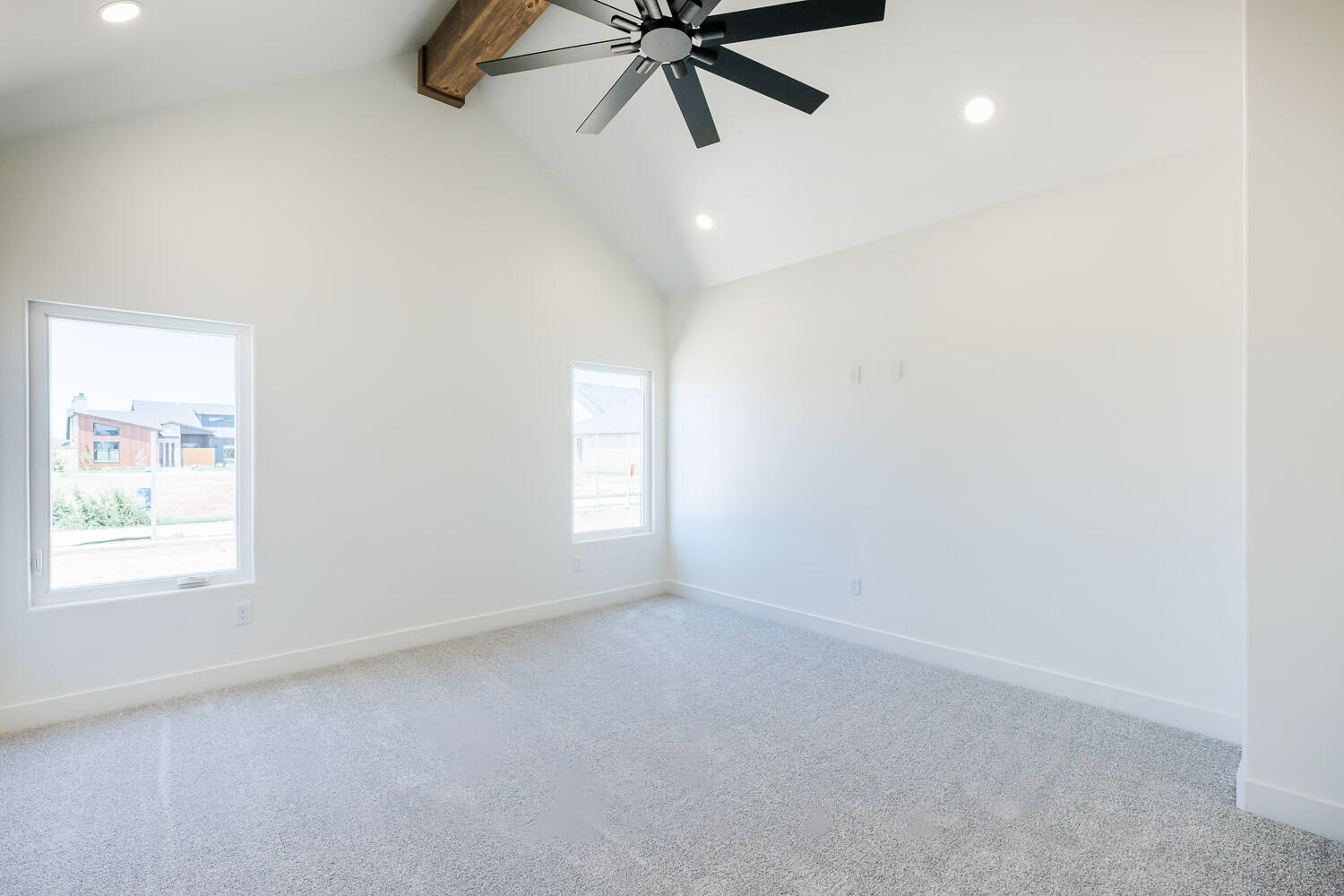 3634 144th Street Lubbock, TX 79423 - Photo 25 of 55 an empty room with a window and a fan