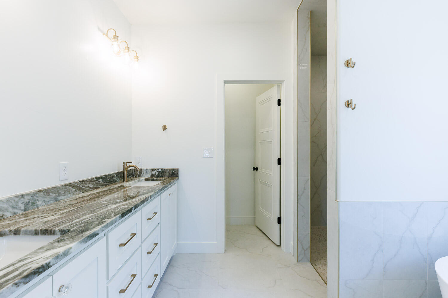 3634 144th Street Lubbock, TX 79423 - Photo 34 of 55 a spacious bathroom with a granite countertop sink and a mirror
