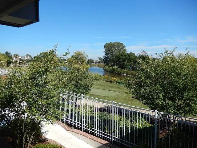 a view of a balcony with an outdoor space