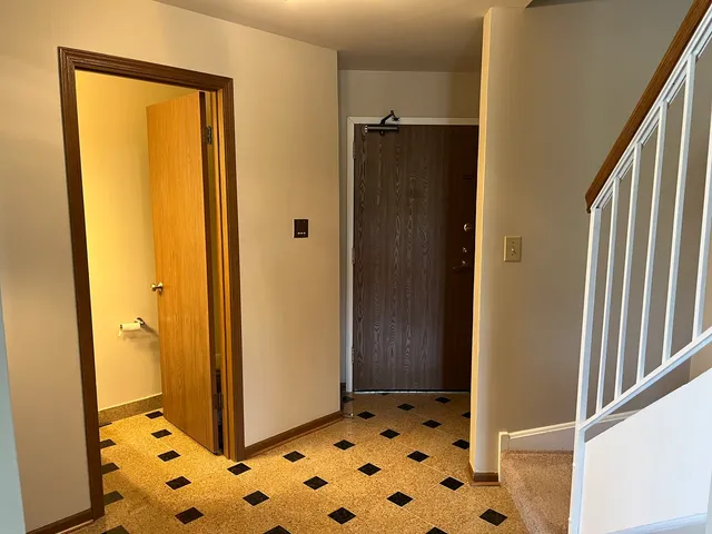 a bathroom with a shower and a sink