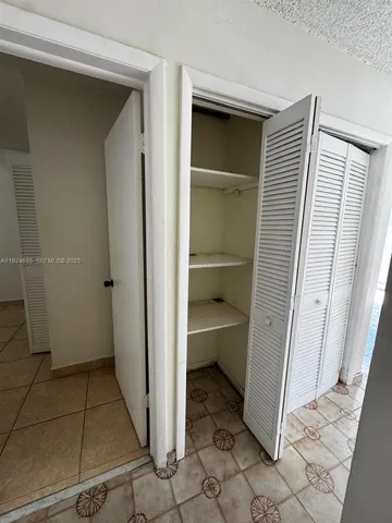 a view of a walk in closet