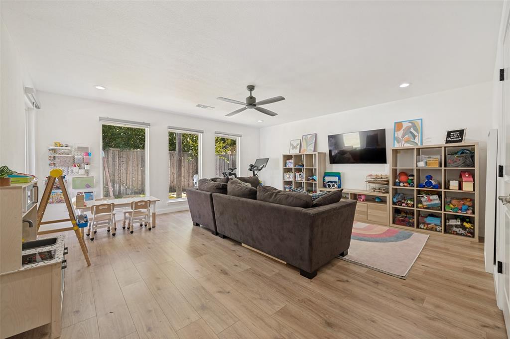 3619 Merrell Road Dallas, TX 75229 - Photo 13 of 26 Spacious interior featuring wood-finish flooring, white walls, and recessed lighting