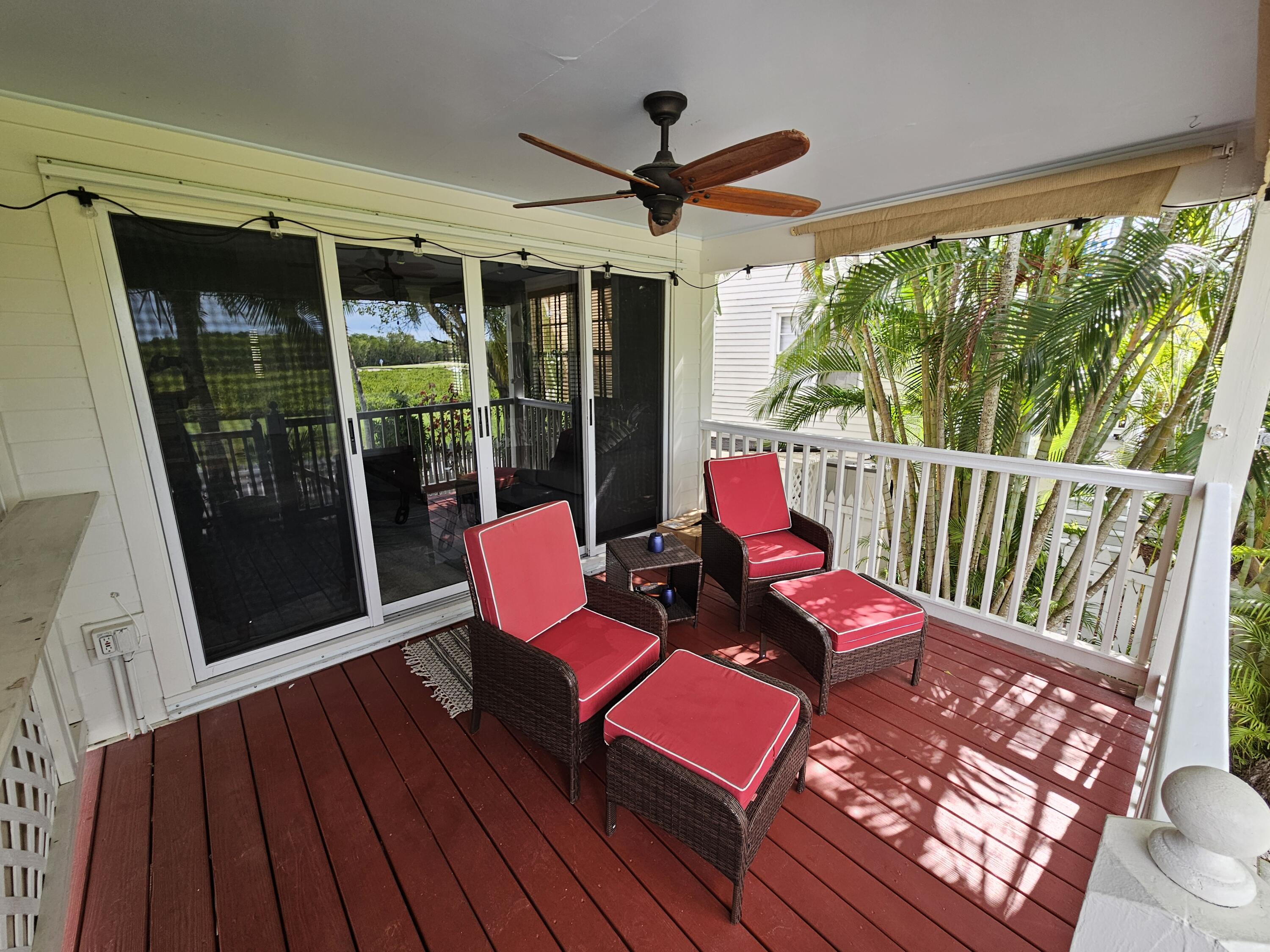 22 Merganser Lane Key West, FL 33040 - Photo 13 of 46 a view of a living room with furniture and a window