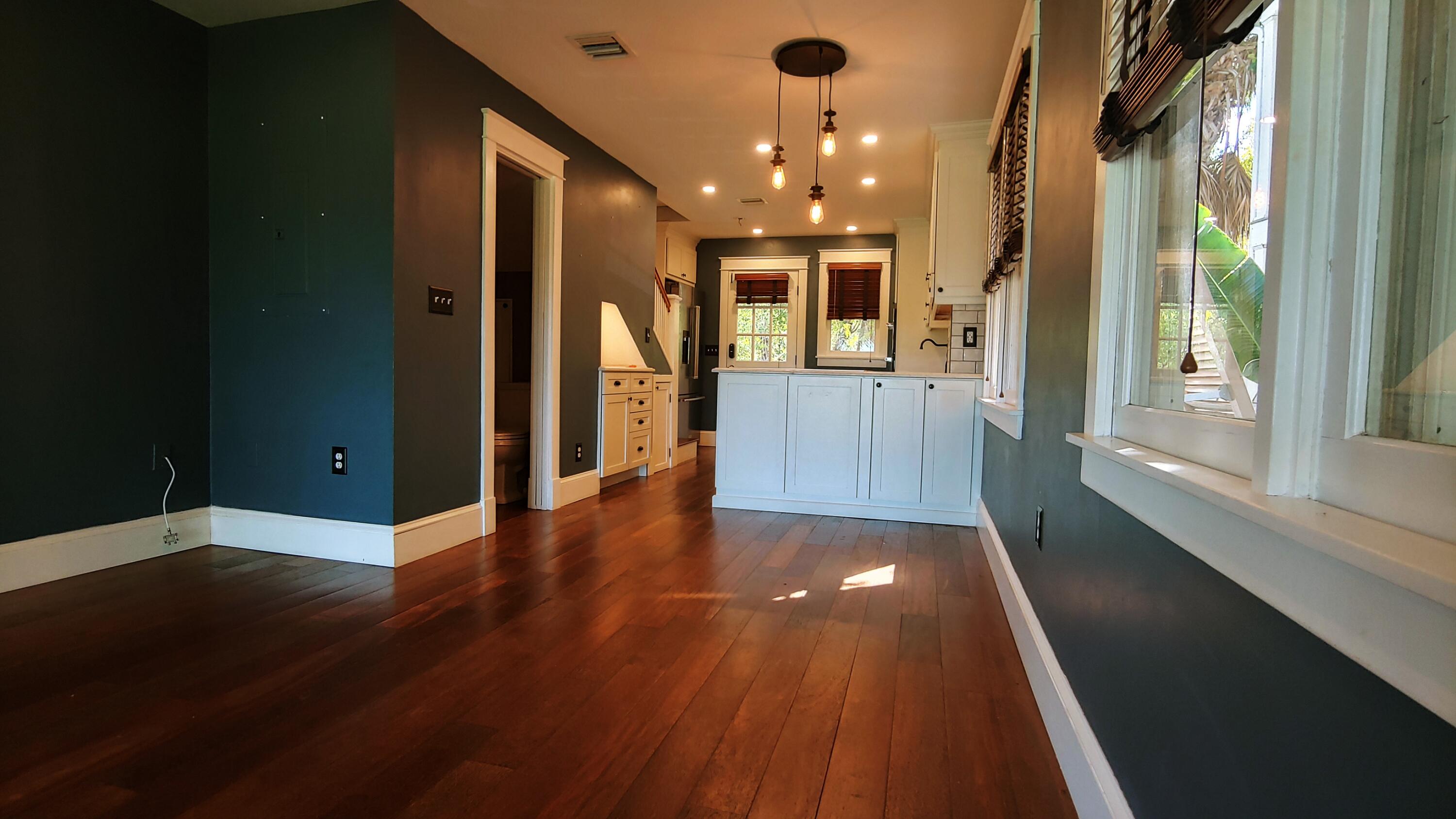 22 Merganser Lane Key West, FL 33040 - Photo 27 of 46 wooden floor in an empty room with a window