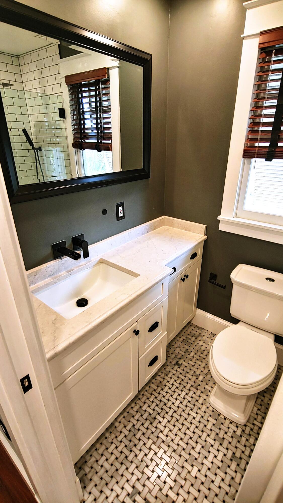 22 Merganser Lane Key West, FL 33040 - Photo 34 of 46 a bathroom with a sink toilet and mirror