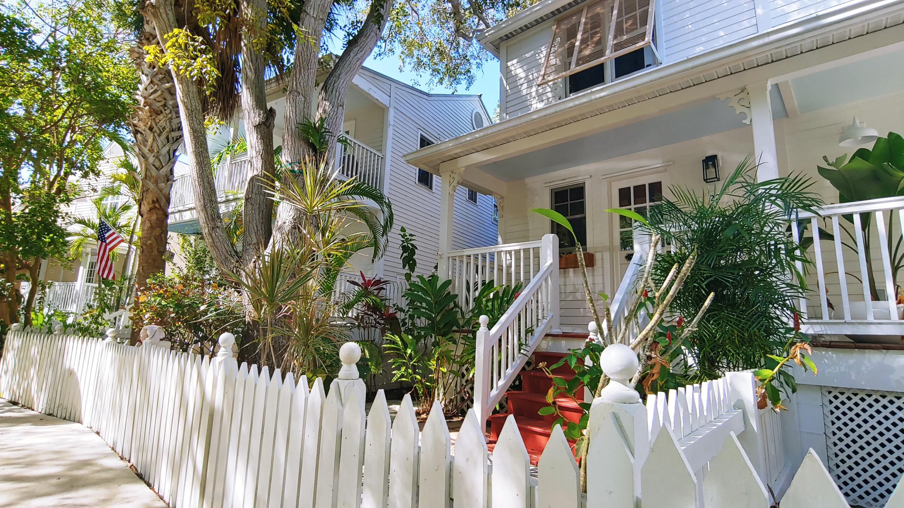 22 Merganser Lane Key West, FL 33040 - Photo 4 of 46 a front view of house with a garden