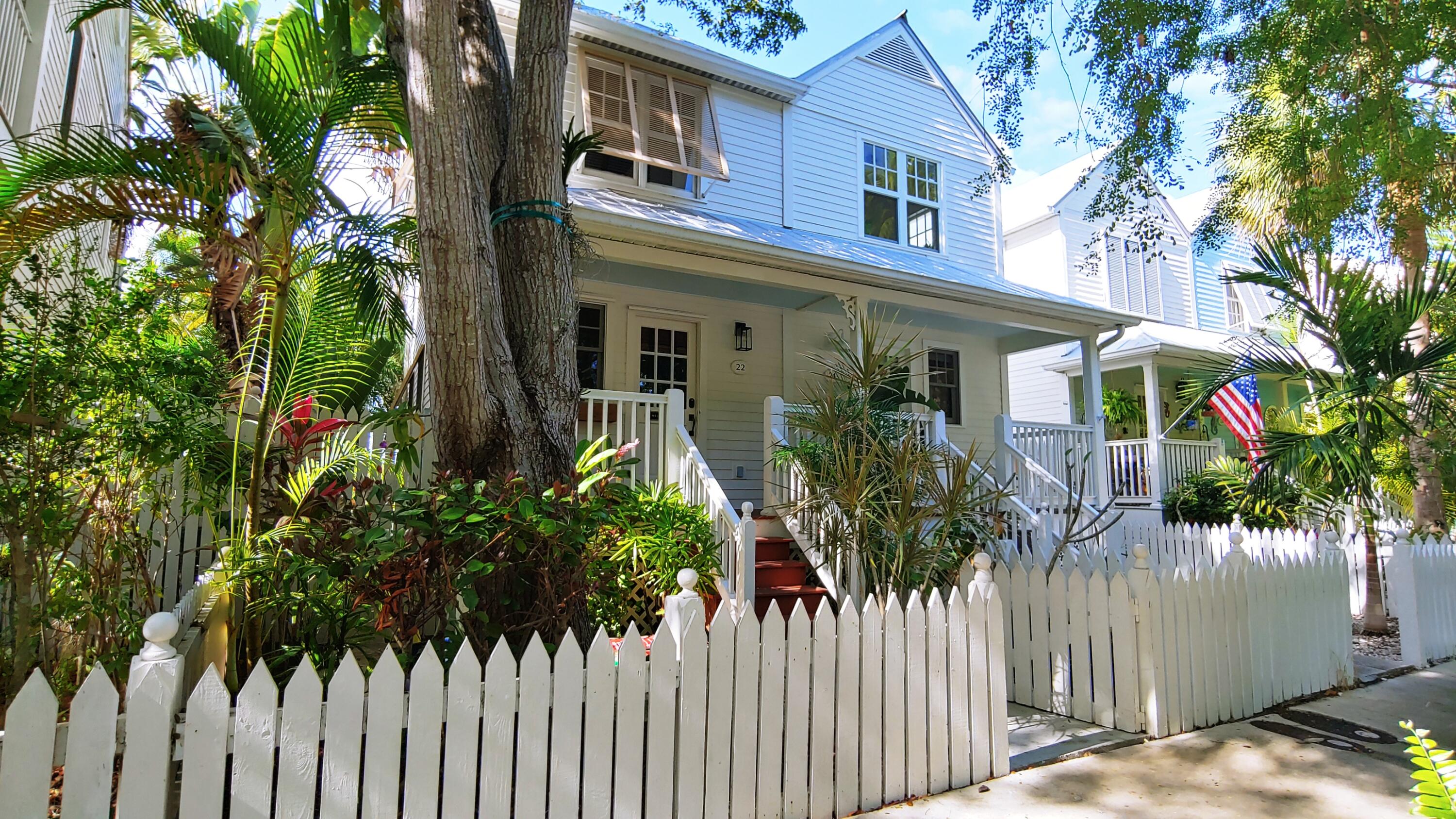 22 Merganser Lane Key West, FL 33040 - Photo 8 of 46 a front view of a house with a tree