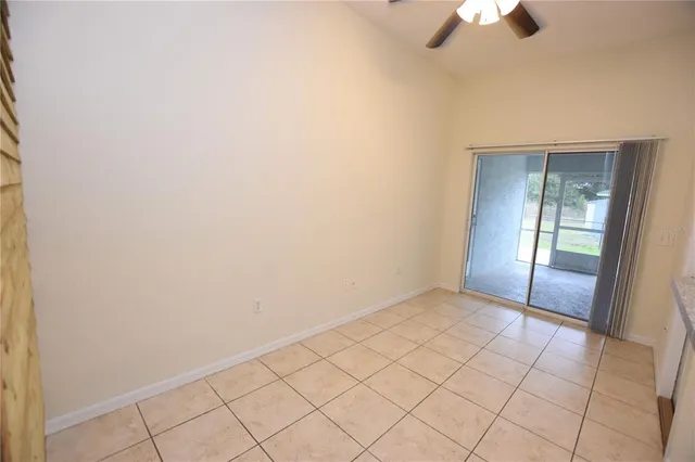 an empty room with fan