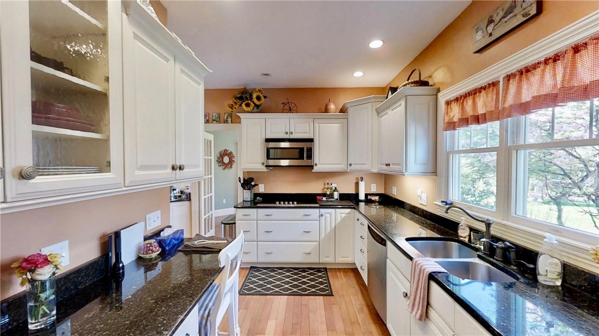 84 Chase Hill Road Hopkinton, RI 02804 - Photo 13 of 27 Granite kitchen, stainless steel appliances, hardwoods.