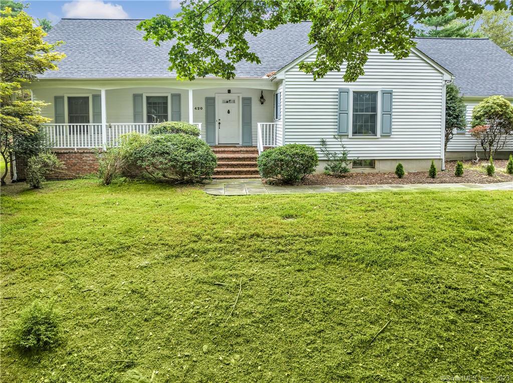 a house view with a garden space