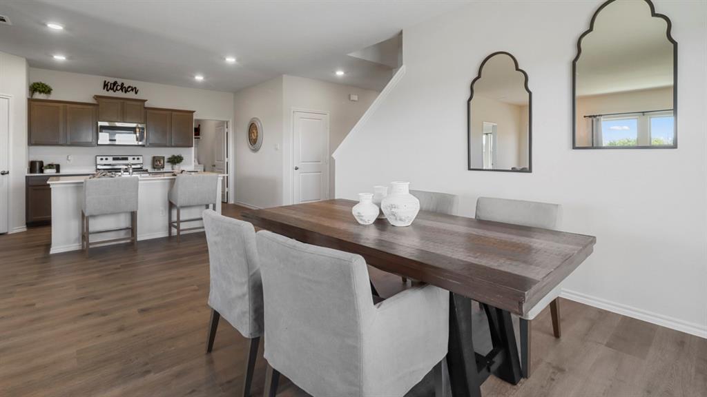 636 Dunham Road Nevada, TX 75173 - Photo 15 of 31 Open-concept dining area featuring wood-finish flooring