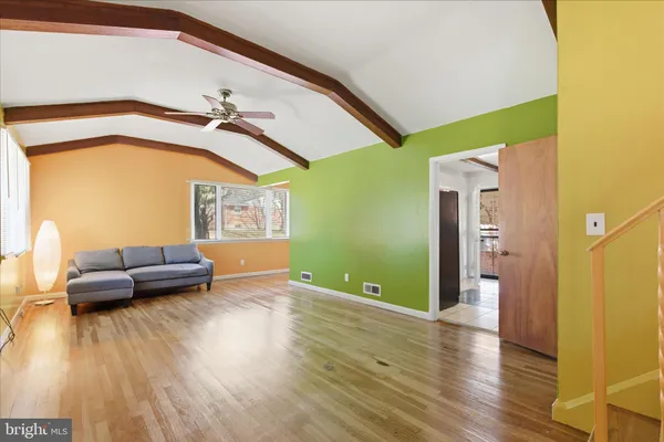 a view of livingroom with furniture and wooden floor