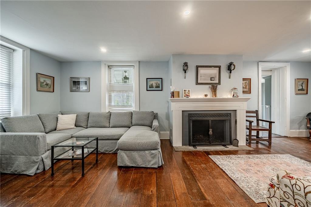 701 Oakbourne Road West Chester, PA 19382 - Photo 10 of 50 a living room with furniture and a fireplace