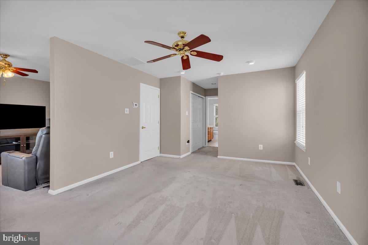 68 Hillside Lane Mount Laurel, NJ 08054 - Photo 24 of 36 a view of a livingroom with a ceiling fan