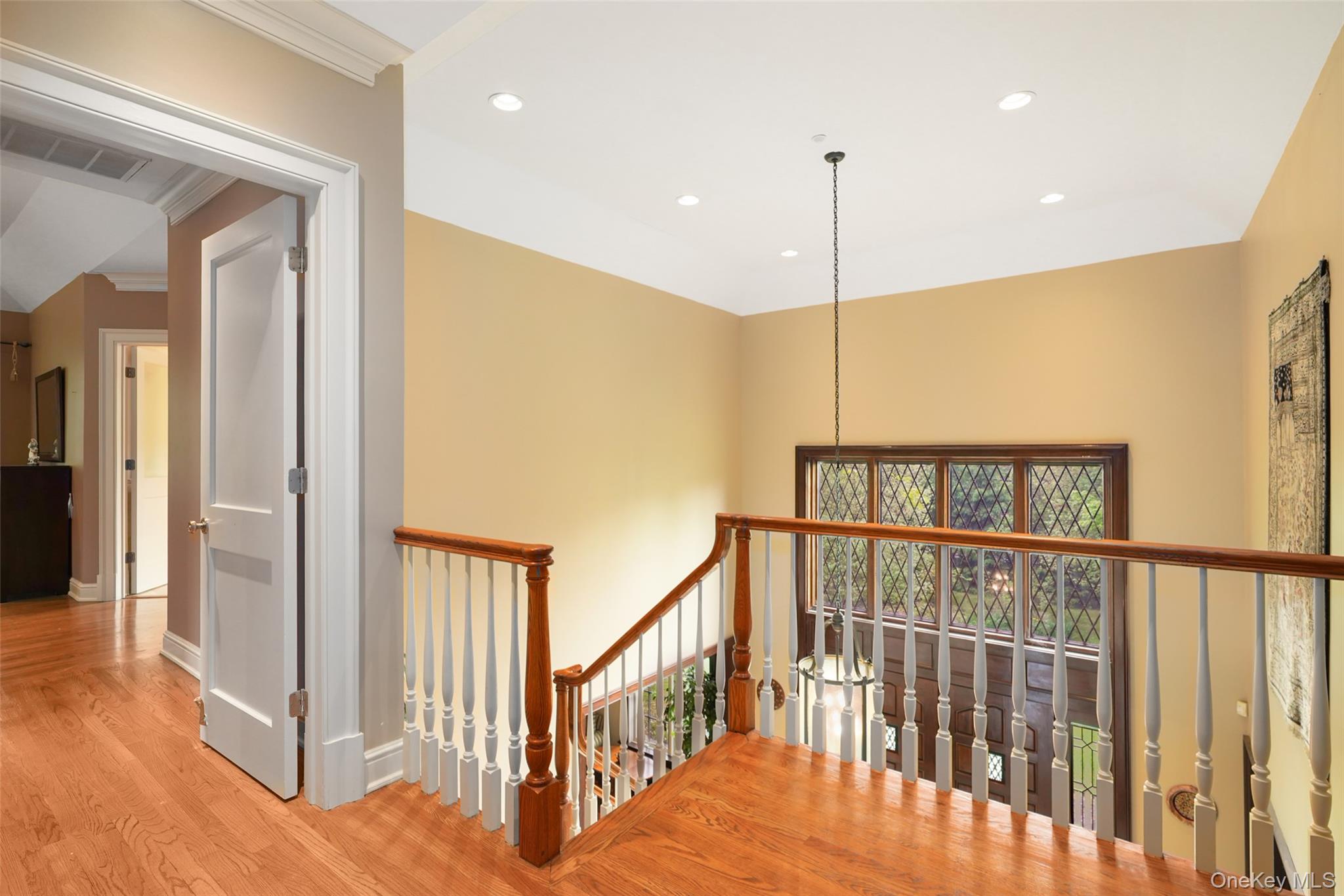 3747 Purchase Street Purchase, NY 10577 - Photo 20 of 48 a view of a hallway with windows