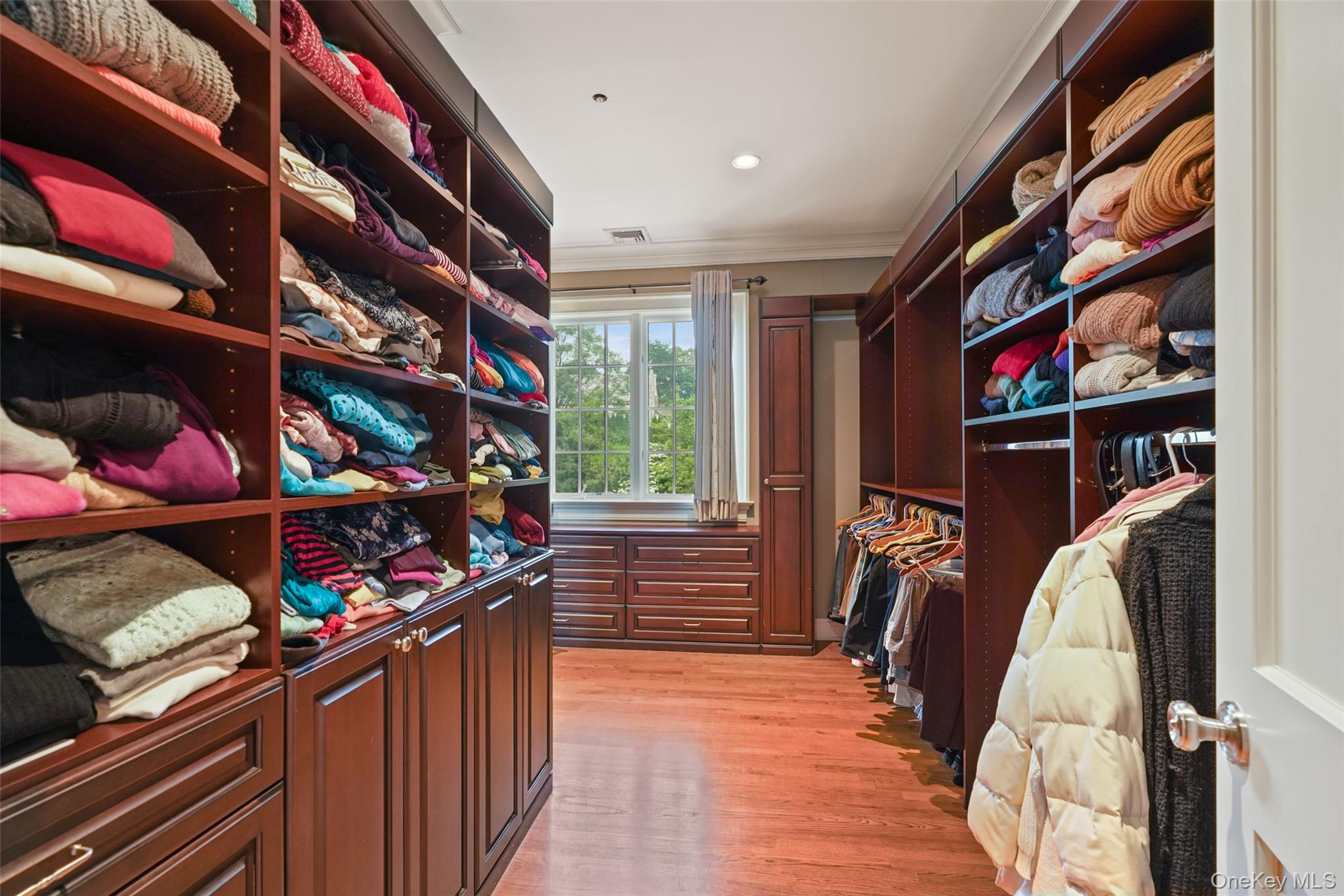 3747 Purchase Street Purchase, NY 10577 - Photo 24 of 48 a view of walk in closet with clothes and shoes
