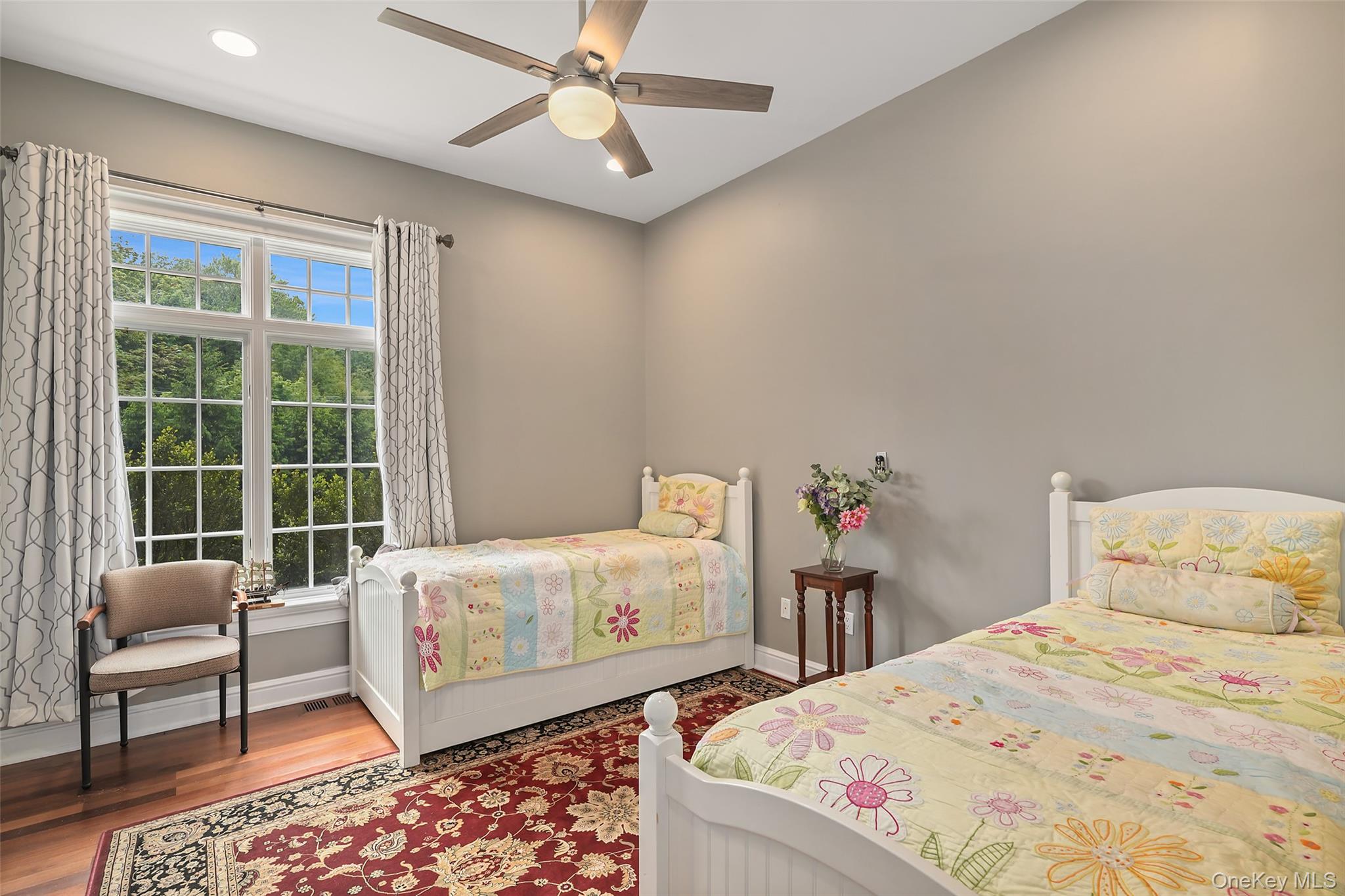 3747 Purchase Street Purchase, NY 10577 - Photo 26 of 48 a bedroom with a bed and a couch