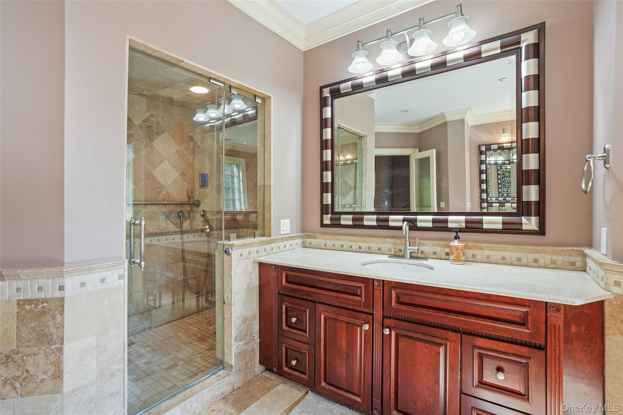 3747 Purchase Street Purchase, NY 10577 - Photo 39 of 48 a bathroom with a double vanity sink and a mirror