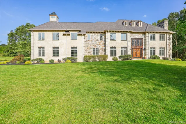 a view of a building with a yard