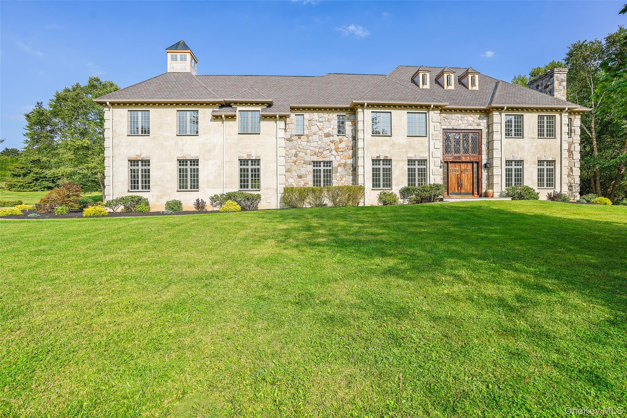 3747 Purchase Street Purchase, NY 10577 - Photo 44 of 48 a view of a building with a yard