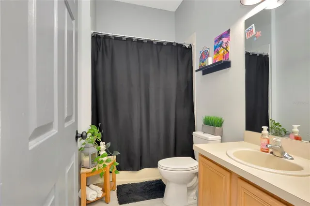 a bathroom with a sink and toilet